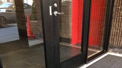 Bottom of Aluminum frame heavy gauge doors with interior carpet Photo