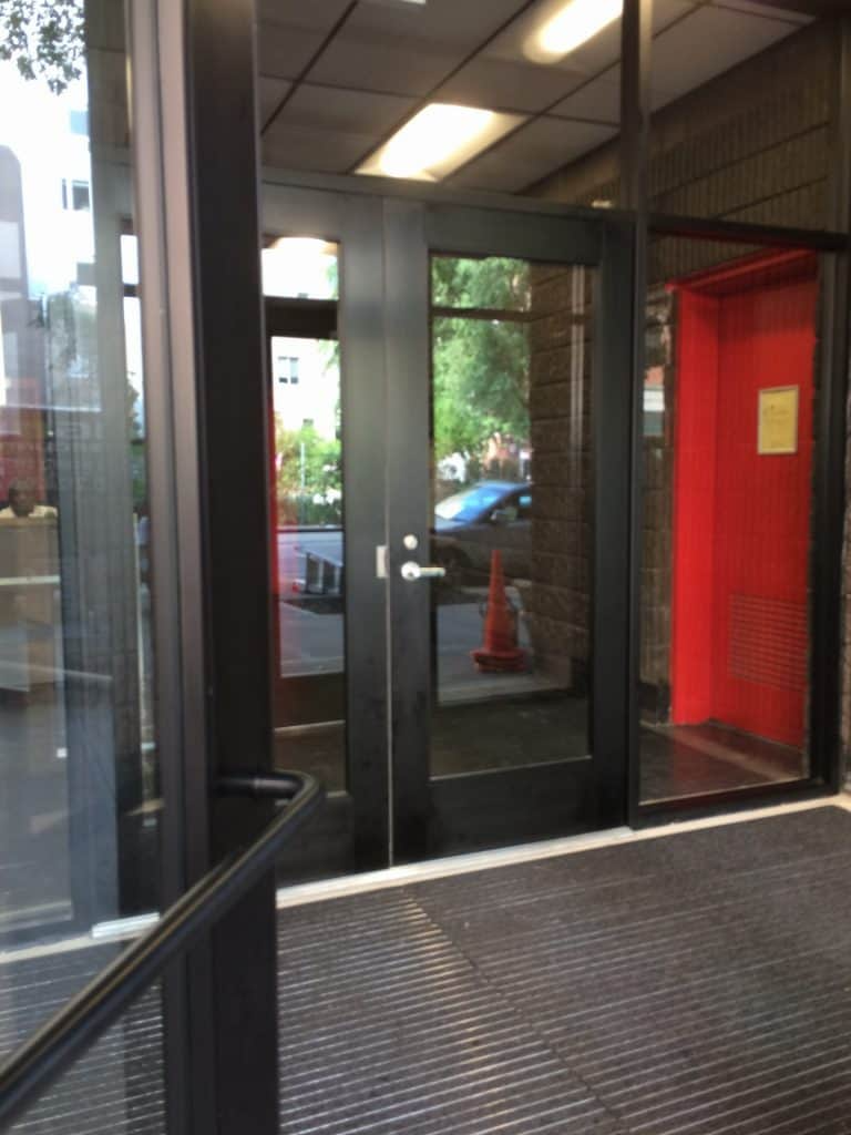 View of installed Heavy gauge doors with tempered glass windows Photo